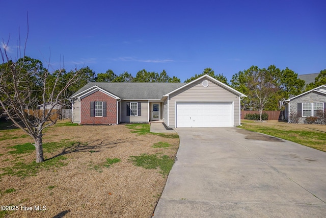 single story home with a garage and a front lawn