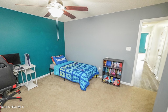 bedroom featuring carpet floors and ceiling fan