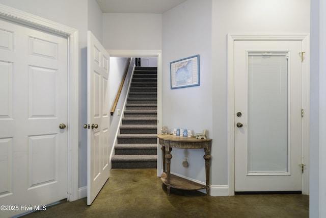 view of carpeted foyer