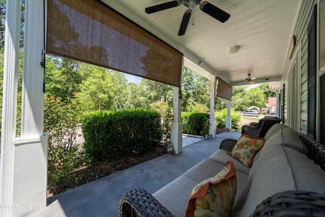 view of patio featuring outdoor lounge area, covered porch, and ceiling fan