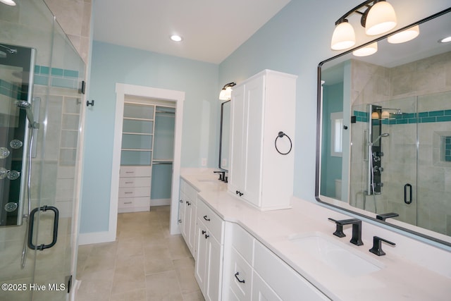 5228 E Beach Dr, Oak Island, NC 28465 - full bath featuring a shower stall, double vanity, and a sink