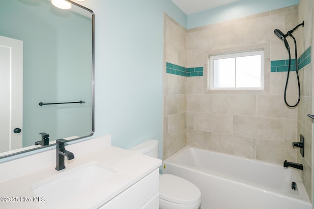 5228 E Beach Dr, Oak Island, NC 28465 - bathroom with tub / shower combination, toilet, and vanity