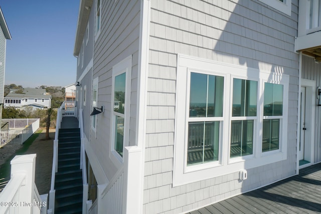 5228 E Beach Dr, Oak Island, NC 28465 - view of side of home featuring stairs