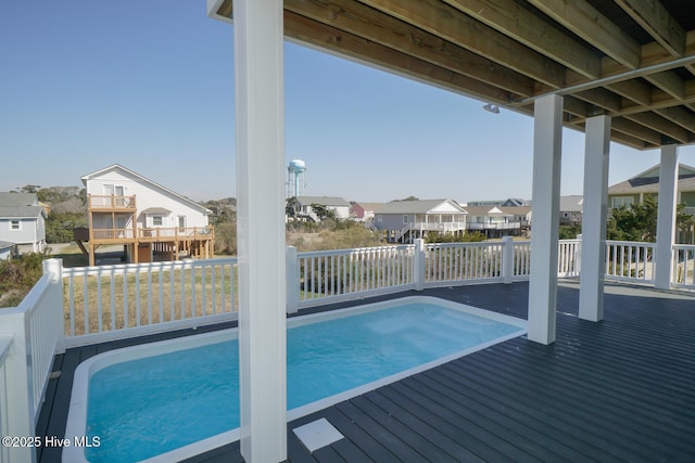 5228 E Beach Dr, Oak Island, NC 28465 - view of pool with a deck and a residential view