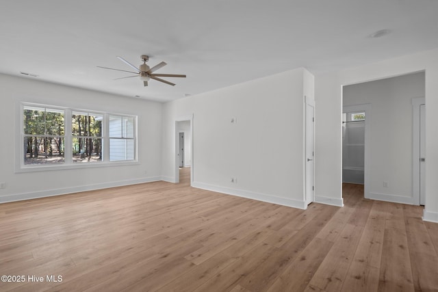 spare room with ceiling fan and light hardwood / wood-style flooring