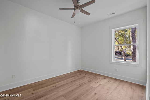 unfurnished room featuring ceiling fan and light wood-type flooring