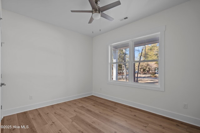 unfurnished room featuring ceiling fan and light hardwood / wood-style flooring