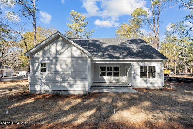 back of property featuring a patio