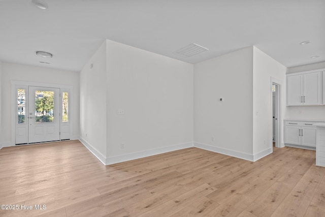 foyer entrance featuring light hardwood / wood-style floors