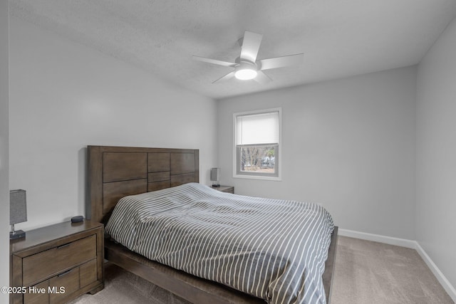 bedroom with light carpet, a ceiling fan, and baseboards