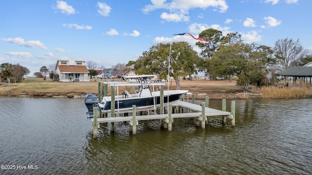 dock area with a water view and boat lift