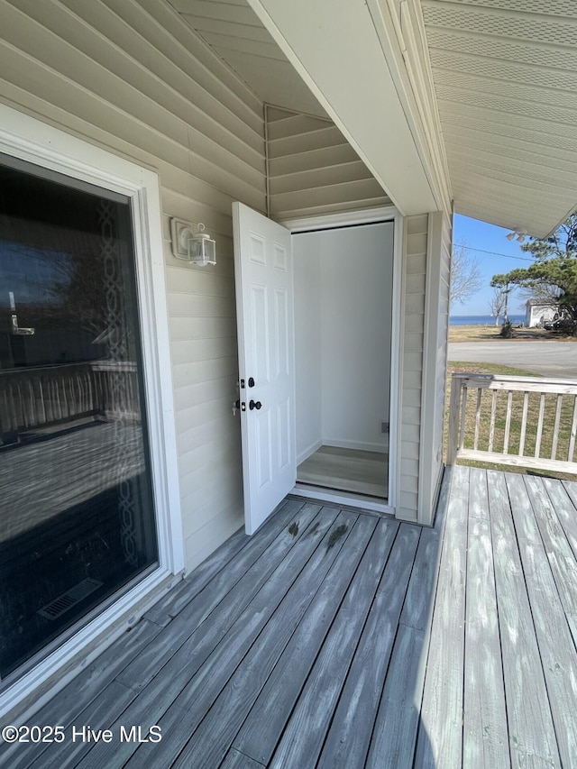 property entrance with a standing seam roof and metal roof