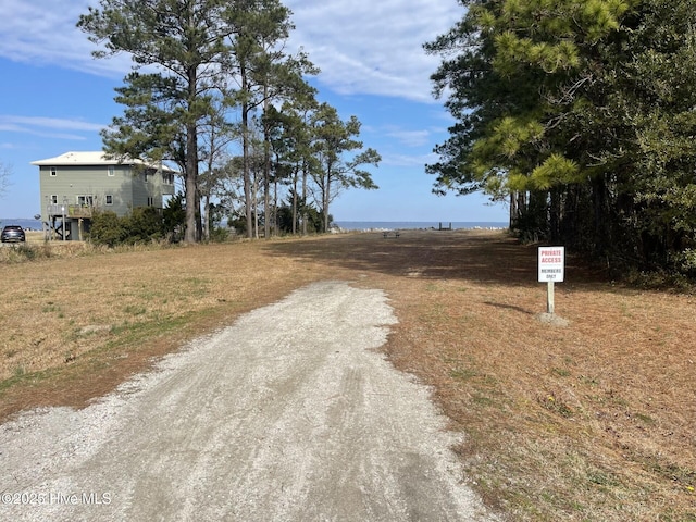 view of road featuring a water view