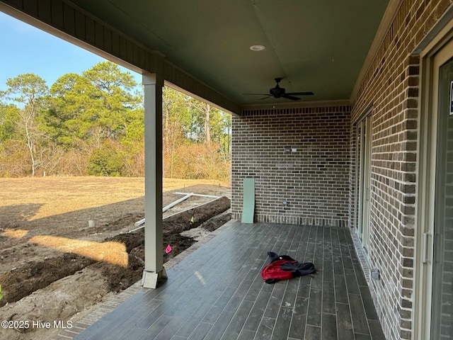 view of patio / terrace featuring ceiling fan