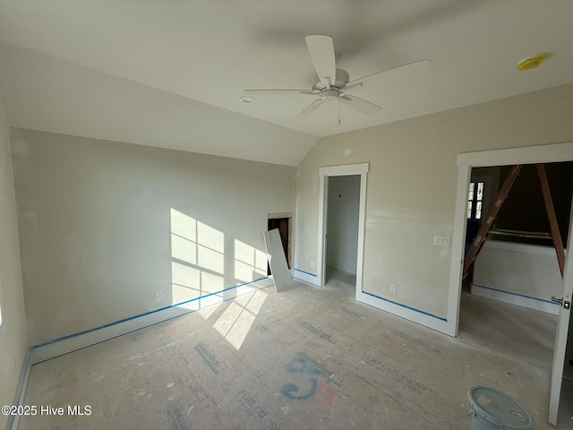 unfurnished room with lofted ceiling and ceiling fan