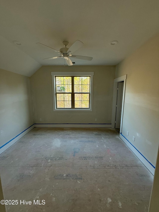 bonus room with vaulted ceiling and ceiling fan