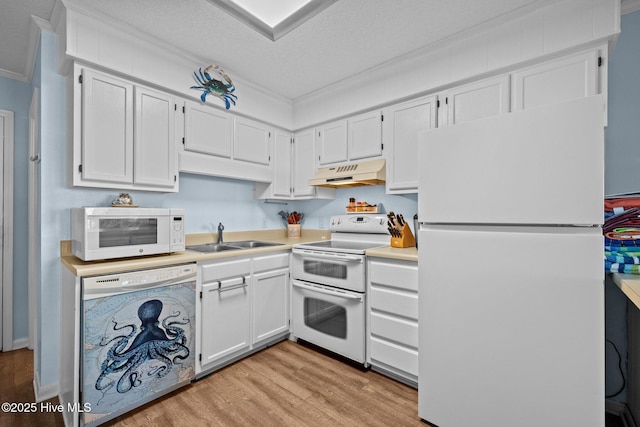 kitchen featuring sink, white cabinets, crown molding, white appliances, and light hardwood / wood-style flooring