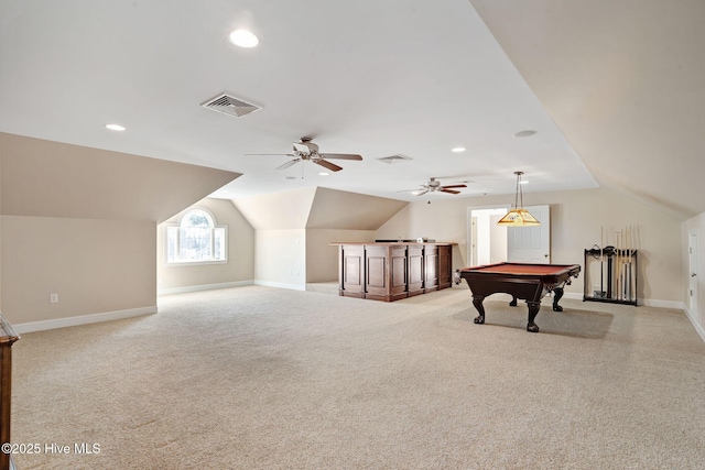 recreation room with light colored carpet, vaulted ceiling, and billiards