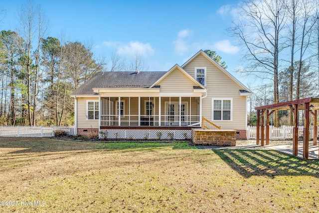 back of house with a yard and covered porch