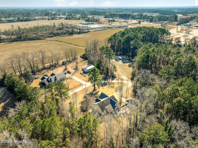 birds eye view of property featuring a rural view