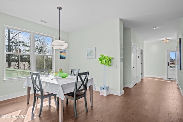 dining room featuring dark hardwood / wood-style floors