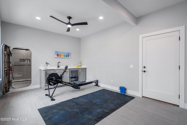 exercise room featuring ceiling fan