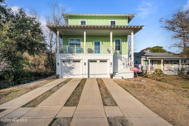 view of front of house featuring a garage and covered porch