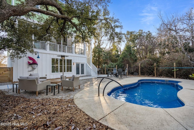 view of pool featuring a patio area and outdoor lounge area