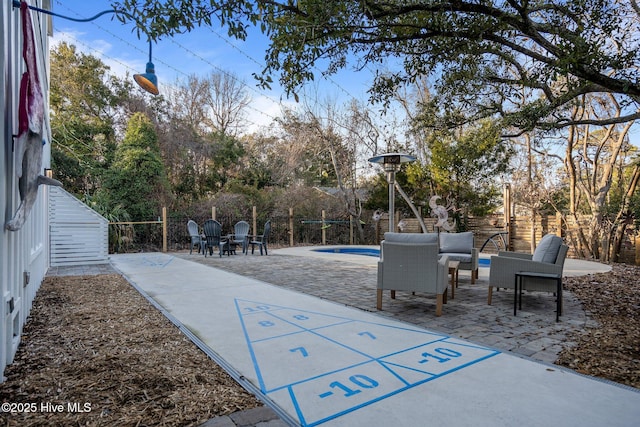 view of home's community with outdoor lounge area