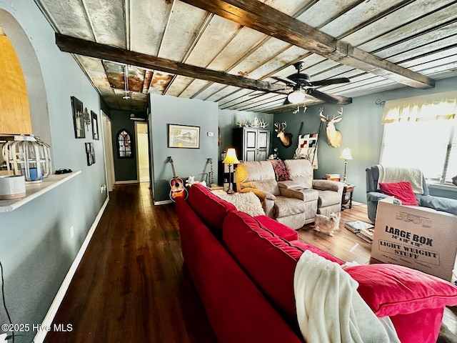 living room with wood-type flooring, ceiling fan, and beam ceiling