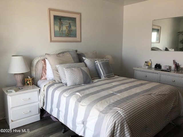 bedroom featuring dark wood-type flooring