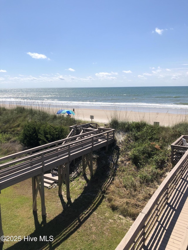 property view of water featuring a view of the beach