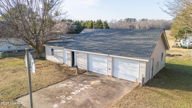 garage with a yard