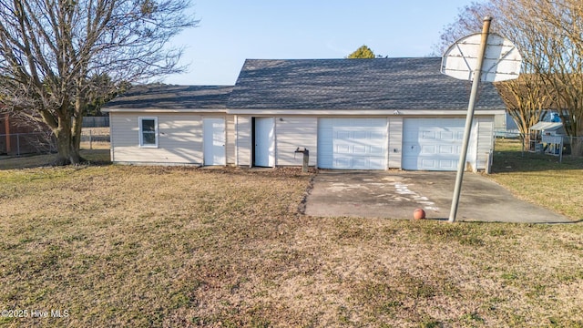 garage with a lawn