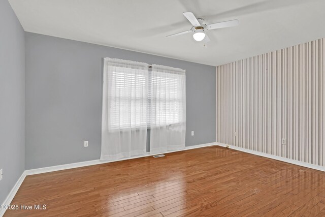 spacious closet with dark carpet