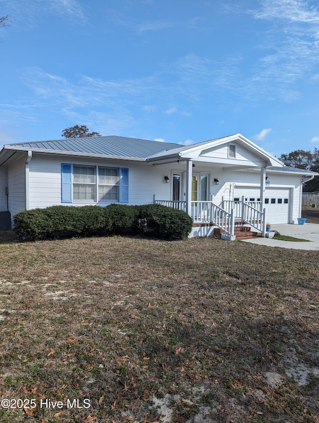 ranch-style house with a garage, a front lawn, and a porch