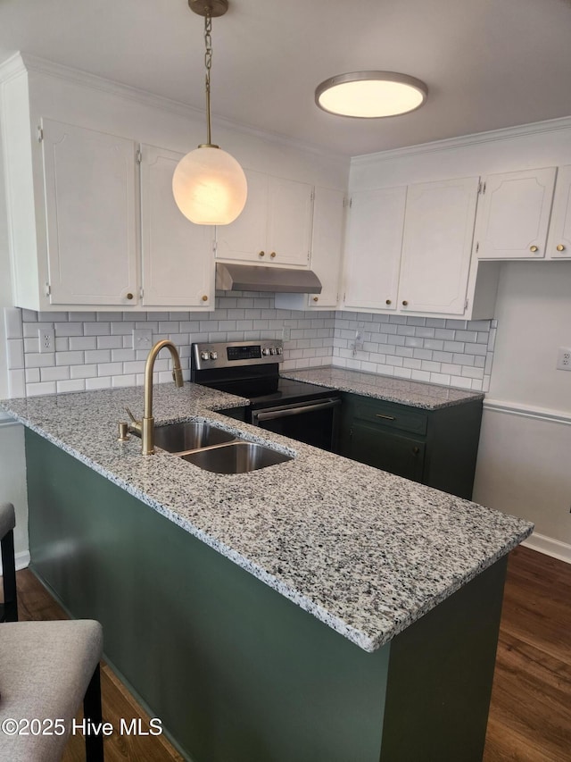 kitchen with white cabinetry, sink, hanging light fixtures, electric range, and light stone counters