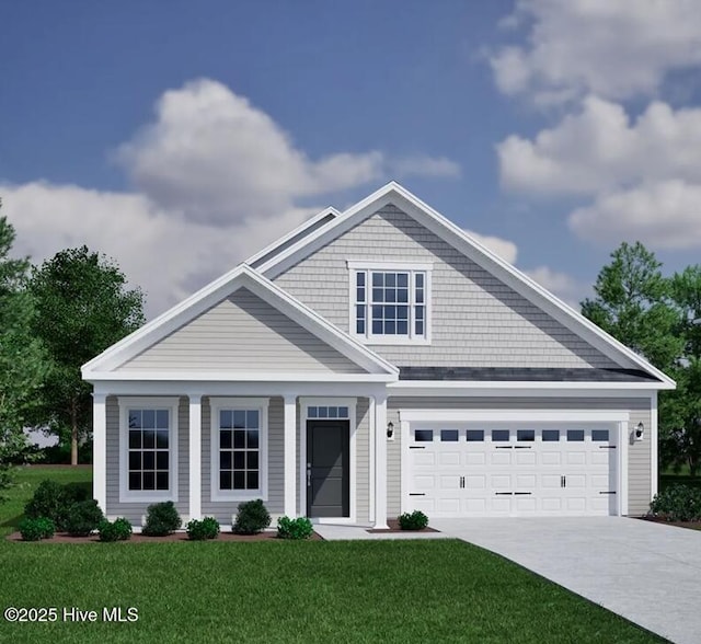 view of front of property with a garage and a front lawn