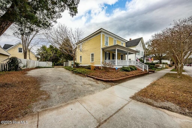 view of home's exterior featuring a porch