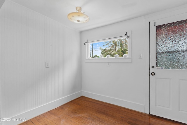 doorway to outside featuring hardwood / wood-style flooring