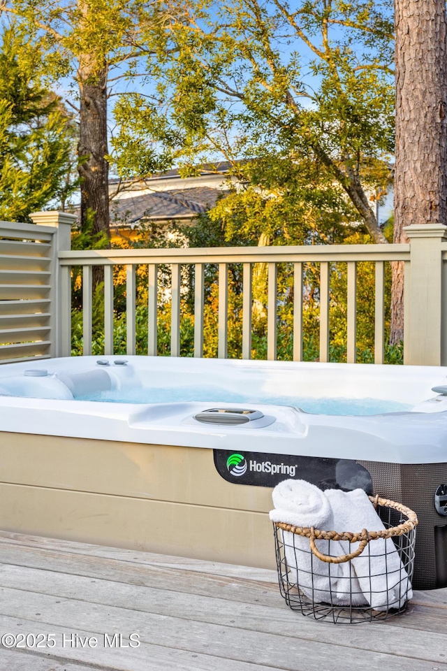 exterior space featuring a jacuzzi