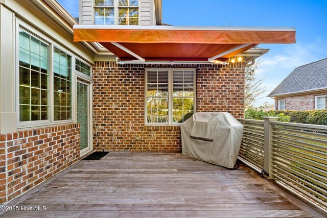 deck featuring grilling area