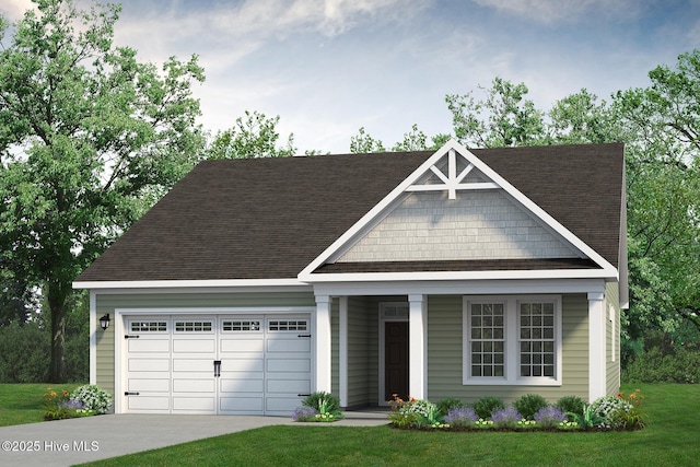 view of front of property featuring a front yard, concrete driveway, roof with shingles, and an attached garage