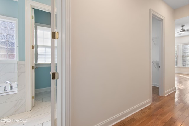 hallway featuring light wood-type flooring