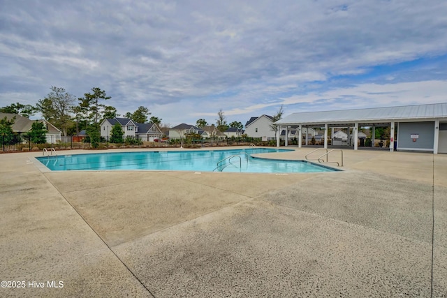 view of pool featuring a patio area