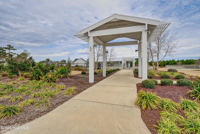 view of home's community with a pergola