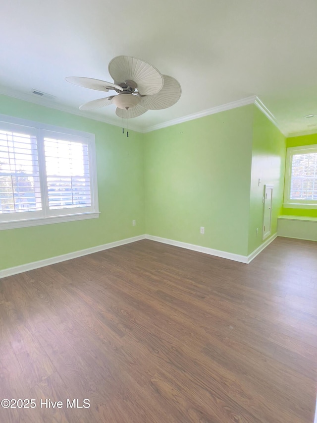 unfurnished room featuring wood-type flooring, ceiling fan, and crown molding