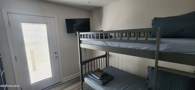 bedroom featuring wood-type flooring