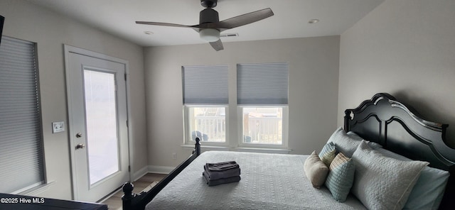 bedroom featuring hardwood / wood-style flooring and ceiling fan