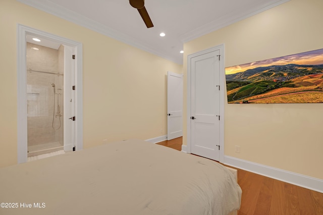 unfurnished bedroom featuring crown molding, ceiling fan, wood-type flooring, and ensuite bathroom